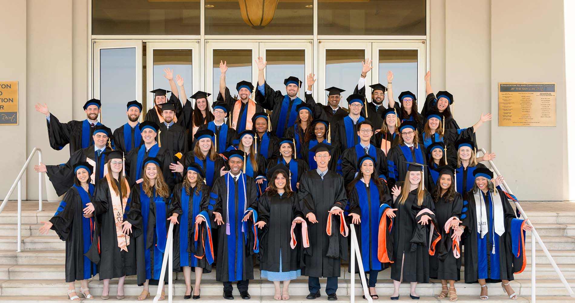 A group photo of GSBS graduates in the cap and gowns