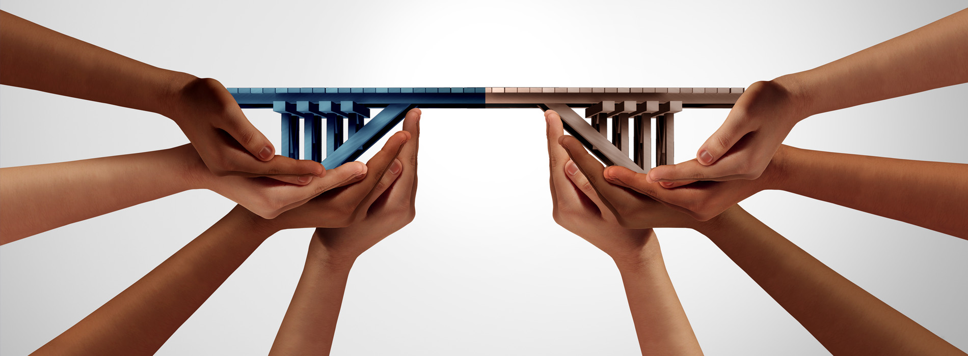 Hands holding a bridge structure
