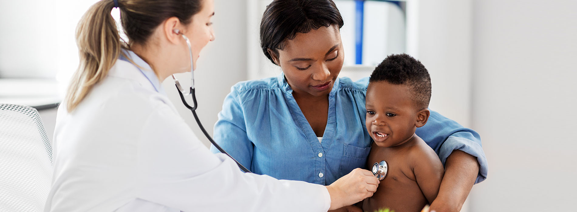 Doctore checking babies heart