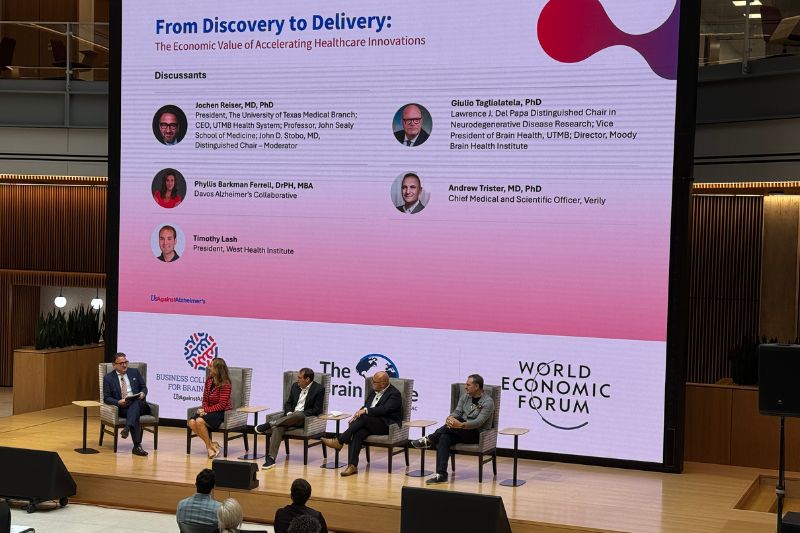 UTMB President Dr. Jochen Reiser sits on stage for a panel discussion on the economic value of accelerating healthcare innovations