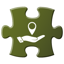 Teal puzzle piece with handle holding map marker icon